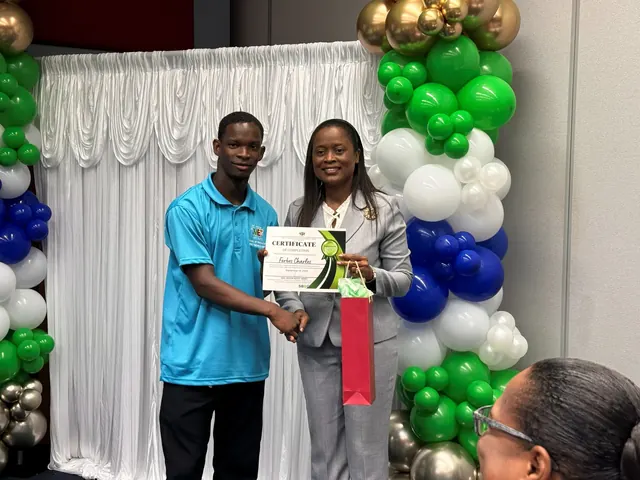 PS awards certificate to SBDC YEA! Intern