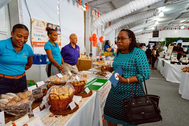 Mrs. Wells — Caribbean Grains Booth Trade Show